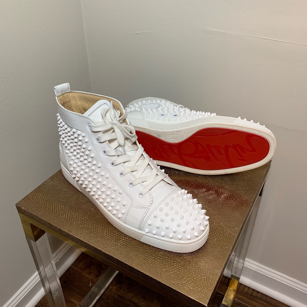 Christian Louboutin's white high-top sneakers